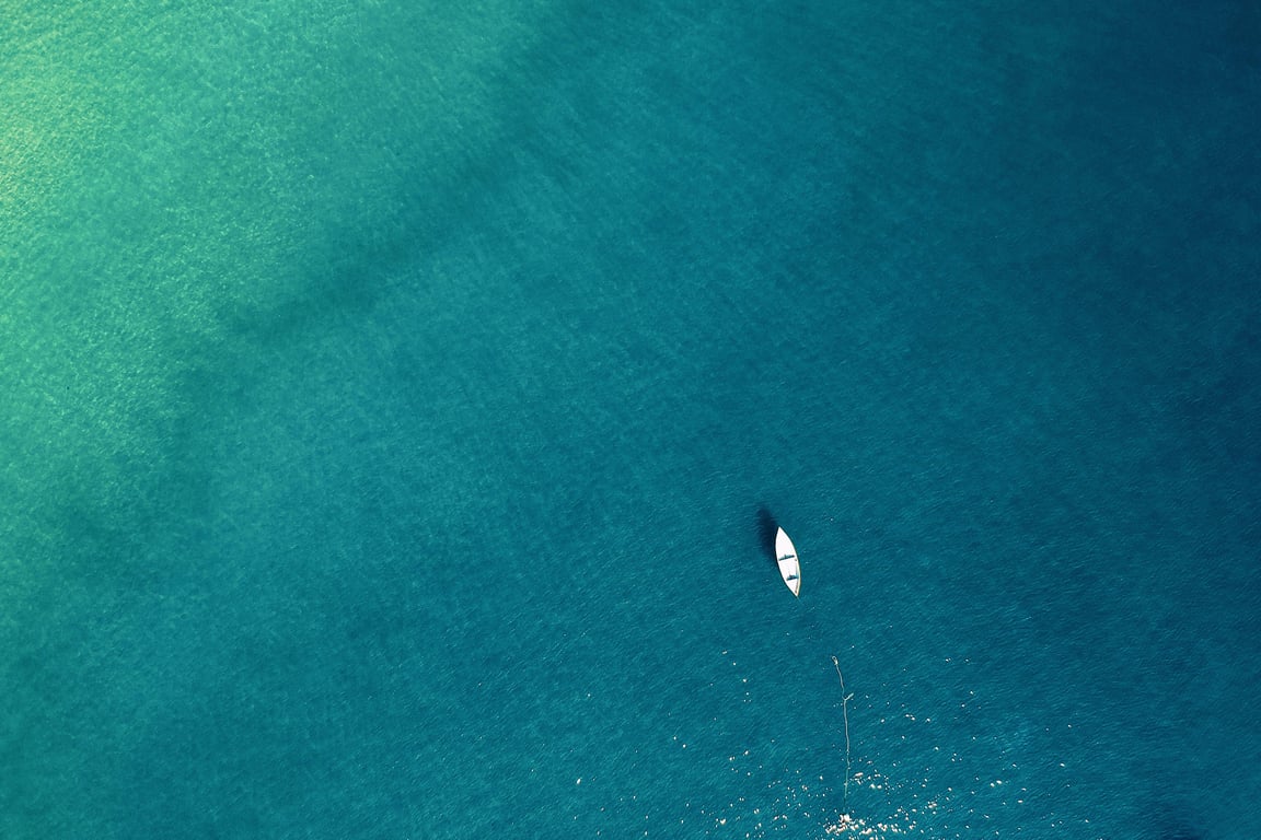 Depiction of a seemingly calm sea with turbulent water underneath, symbolizing the hidden struggles of high-functioning anxiety