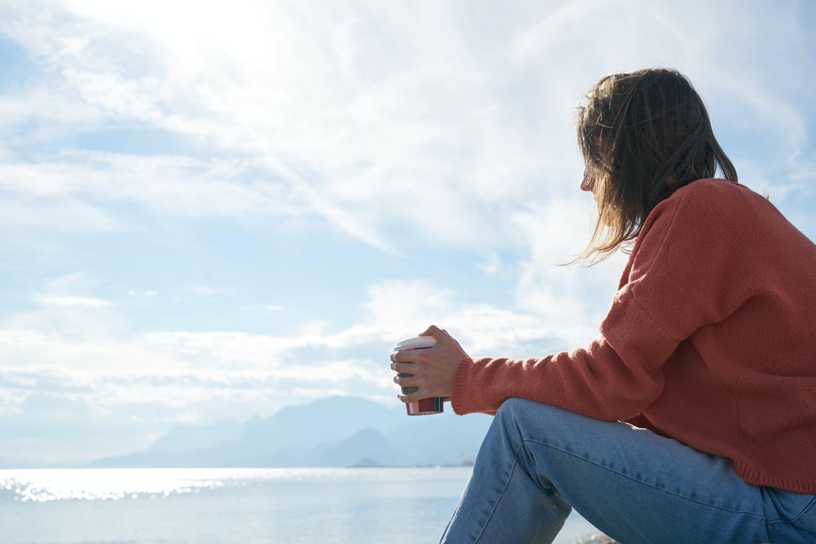 A person reflecting and thinking, signifying the solitude often felt in depression