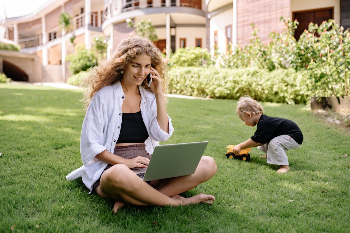 Person using digital mental health resources on multiple devices