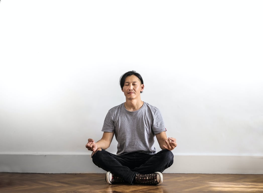 Man practicing mindfulness techniques to control anxiety