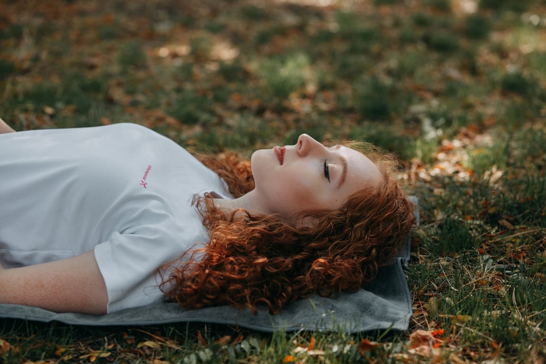 Woman meditating in serenity - Remote Ketamine-assisted Therapy at Pothos Health
